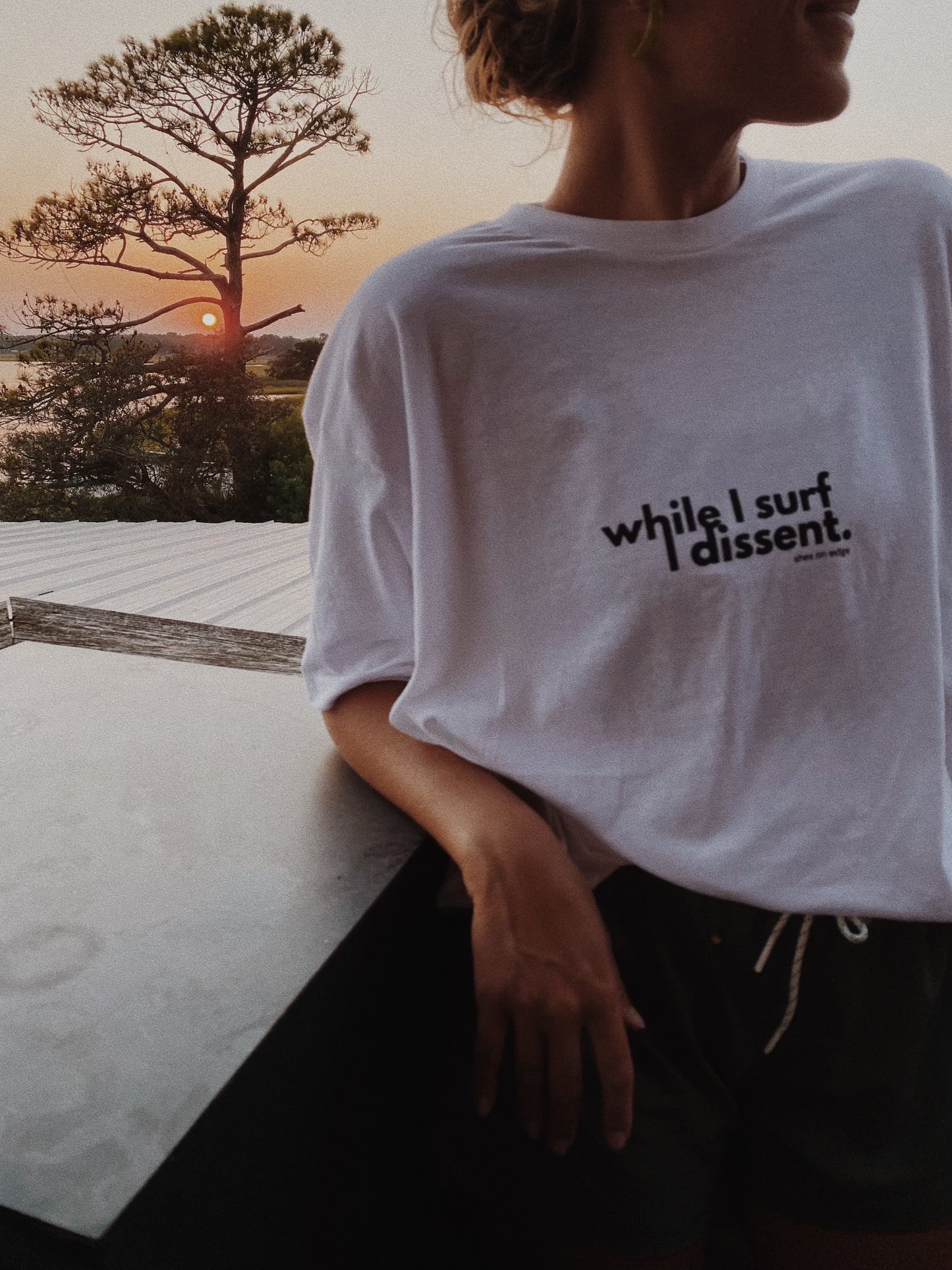 'while i surf, i dissent' tee in white